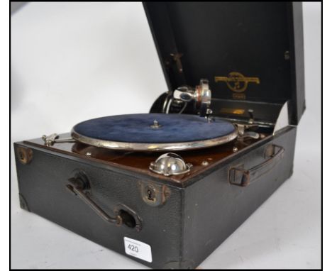An early 20th century vintage Columbia portable wind up picnic grafanola no. 202 gramophone, black vinyl casing winder to the