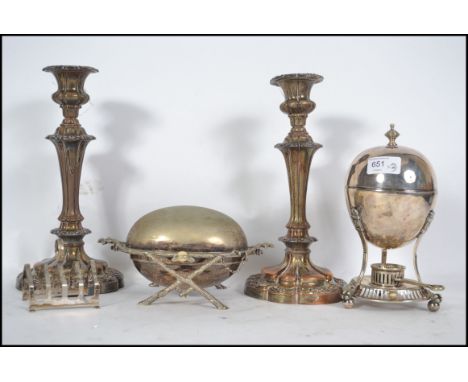A collection of vintage early 20th century items to include egg coddler, bacon warmer, a pair of Art Nouveau plated candle st