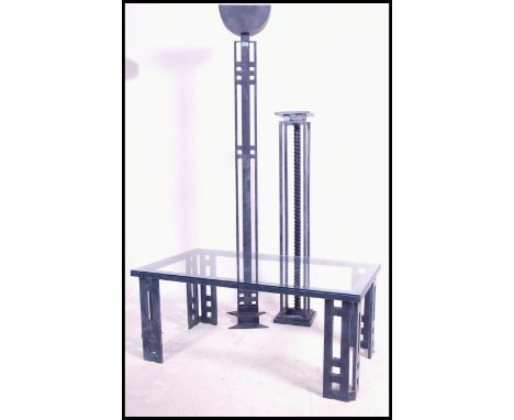 A stunning 3 piece group of retro vintage 1980's furniture.  It comprises a glass topped 4 legged coffe table a tall upright 