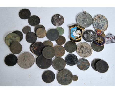 A collection of 19th and 20th century coins both silver and copper together with medals enamel badges etc