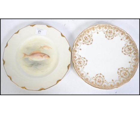 A Royal Doulton Sea Bream cabinet plate by C Hart stamped to the base together with another cabinet plate by Royal Doulton. M