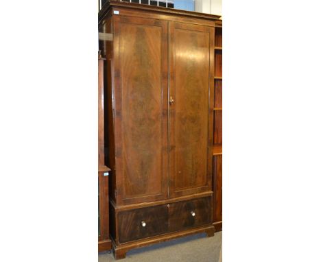 A late Victorian mahogany inlaid fitted double wardrobe armoire. Raised on bracket feet with plinth drawer. Above a double do