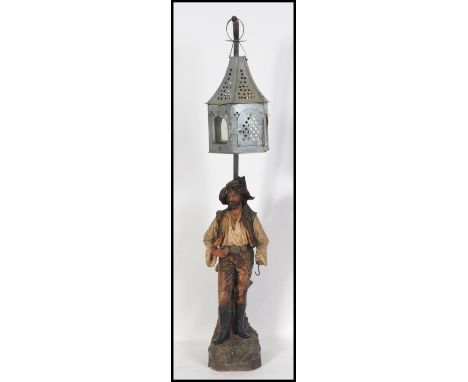 A stunning late 19th / early 20th century cold painted terracotta figural lamp holder in the form of a Pirate by Austrian Joh