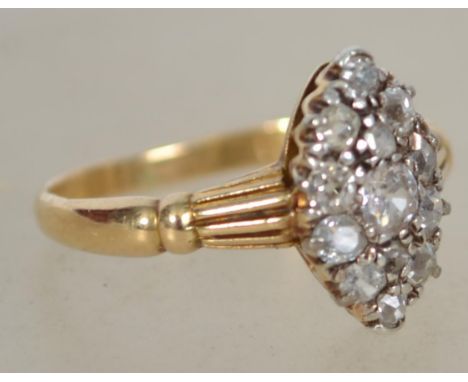 A vintage 18ct gold and diamond ladies marquise shaped diamond ring - cluster ring. Total weight 3.1g / Size N