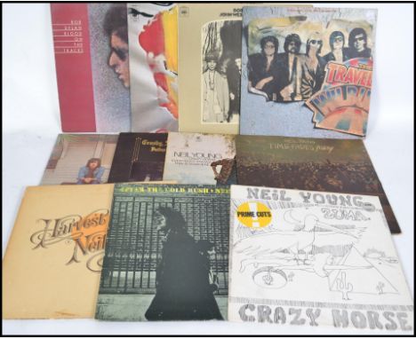 A group of vinyl long play LP records to include Neil young x 5, Crosby Stills and Nash x 2, Bob Dylan x 3 and The Travelling