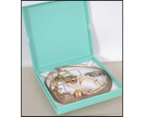 A collection of gilt silvered 925 jewellery to include a pearl bracelet, cocktail watch, earrings, necklaces etc please see i