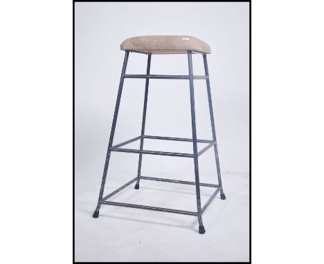 A 1970's retro 20th century Industrial / school gymnastics pommel horse in enamel grey metal tapering scaffold base with sued