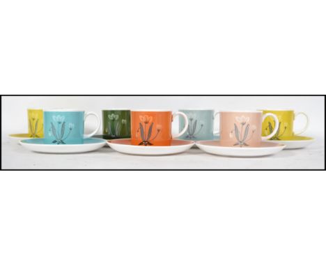 A retro Susie Cooper ceramic part tea service having a multi-coloured design and marked to the base. To include yellow, blue 