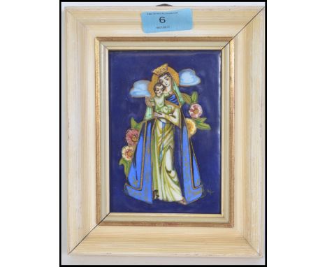 An early 20th century believed Limoges enamel painted ceramic plaque of a religious scene - Icon. Set within white frame. The