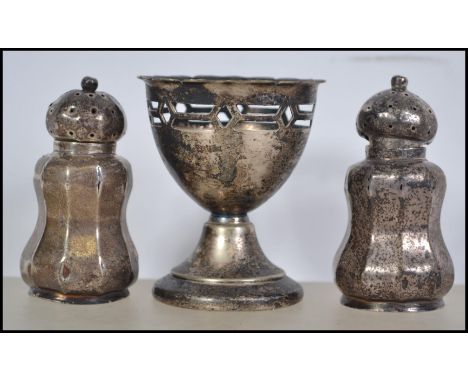 A pair of silver hallmarked condiments by Horton & Allday,Birmingham 1906. Weight 24.9g. Together with a vintage EPNS egg cup