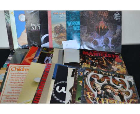 A collection of long play LP's vinyl albums and 12" singles dating to mainly the 1980's featuring several artists on various 
