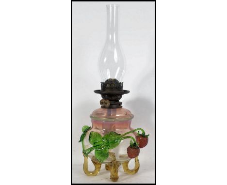 A rare 19th century optic art glass full size oil lamp in the form of a berry having stunning overlaid vaseline glass base an