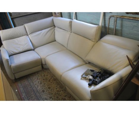 Modern corner sofa, in light grey leather, with phone charging points/USB, 18 months old approx, originally cost over £3000. 