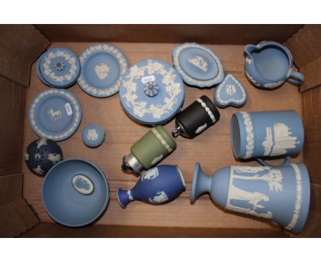 A collection of Wedgwood jasper ware items including black jasper ware table lighter, sage green table lighter, blue dip jasp