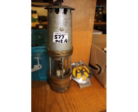A minors Lamp together with Vintage AA membership Badge 