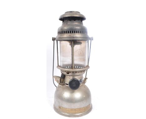 Hipolito - A vintage 20th century Hipolito H-502 Automatic West German paraffin / kerosene storm lamp. The lamp on a rounded 