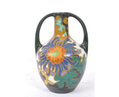 Holland Amphora - An early 20th Century ceramic Holland Amphora twin handle chrisant Art Nouveau bulbous vase. Decorated with