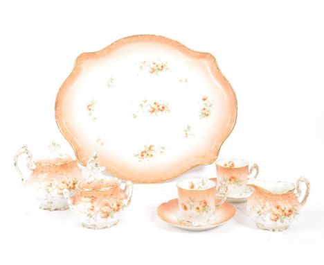 An early 20th Century Edwardian china porcelain breakfast / tea service in blush pink with floral rose splay decoration. To i