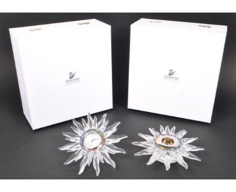 Swarovski - Two boxed Swarovski crystal Solaris decorative table pieces. To include a Swarovski candle holder (236719) in ori