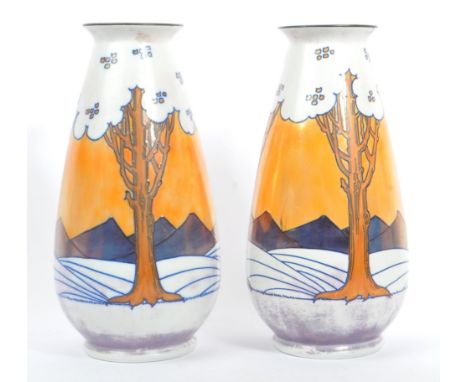 Charlotte Rhead for Burleigh Ware - Art Nouveau style ceramic pair of vases. Tube lined with trees, orange and purple lustre 