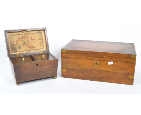 A 19th century mahogany wood tea caddy box with later oak wood writing slope. The tea caddy of cartouche form with bird and b