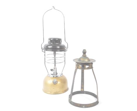 Tilley - A vintage mid 20th century Tilley pressure light / storm lantern. The lamp having a gold painted base, with embossed