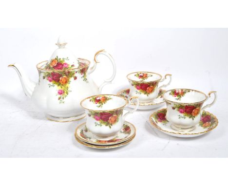 Royal Albert - Old Country Roses - A mid 20th century part tea service / set. Comprising of teapot, saucers and cups. With ma