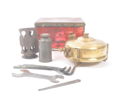 Primus - An early 20th century Primus No. 210 portable camping stove. The stove in original metal tin with original fittings 