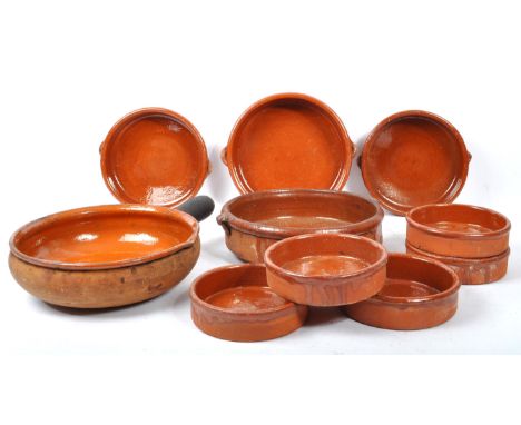 A set of 10 vintage 20th century red clay French terracotta glazed tian bowls / dishes. Comprising of ten tapas style bowls, 