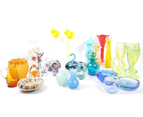 A large collection of 20th Century studio art glass to include uranium glass and makers such as Mdina and Caithness. Consisti