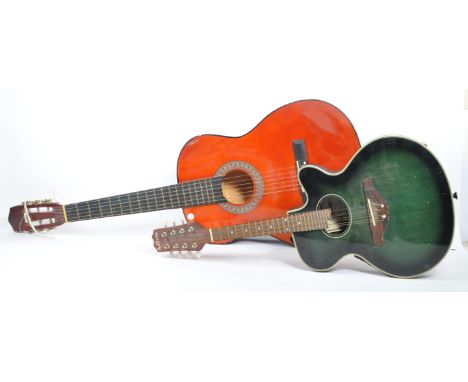 Two mid century / vintage acoustic six string guitars, one by&nbsp;Ashbury.&nbsp;Both shaped with hollow bodies with chrome t