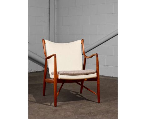 FINN JUHL (DANISH 1912-1989) ARMCHAIR, DESIGNED 1945 model no. NV45, teak and upholstery 84cm high, 69cm wide, 70cm deep (33