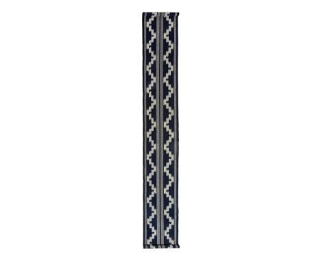  JUN TOMITA (JAPANESE 1951-) IKAT WEAVING (OBI LENGTH KASURI), c.1978 cotton 203.2cm long, 30.5cm wide (80in long, 12in wide)