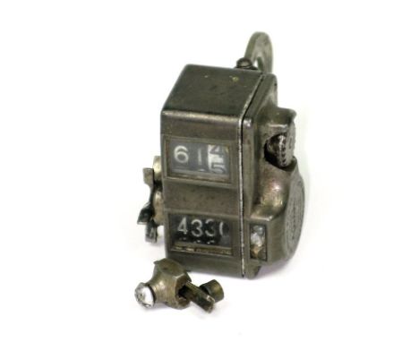 *Odometer. A Veeder 'Cyclometer' with a combination mileage recorder and a three-window trip for a 28-inch wheel,  dated 1940