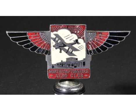 *Northampton Aero Club. A rare member's enamel badge, circa 1930s,  chrome and enamel finish depicting a bi-plane flying over