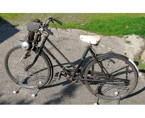 *A 1952 49cc Cairns 'MOCYC' Auxiliary Engine and Sunbeam Bicycle. Driving on the front wheel, this particularly rare engine, 