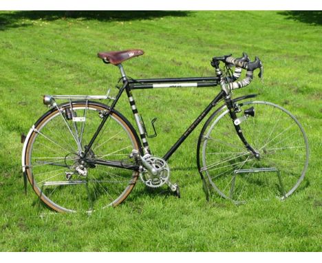 *A circa 1993 Mercian Gentleman's Lightweight Bicycle. A 22 1/2-inch frame finished in black and grey enamel and possessing C