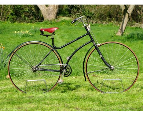 *A Solid-Tyred Safety Bicycle. A black-painted bicycle with good quality, old-style nickel-plating and retaining its rear and