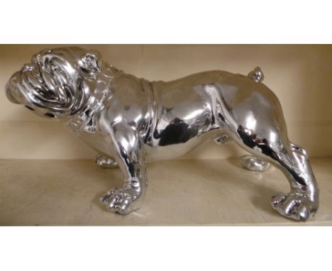 A silvered model of a bulldog 
