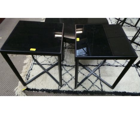A pair of black lacquered lamp tables with glass inserts (2)