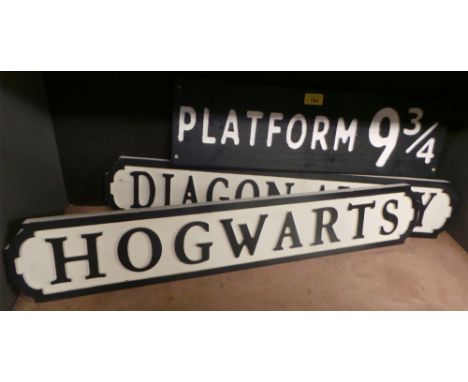 A collection of three Harry Potter themed road signs