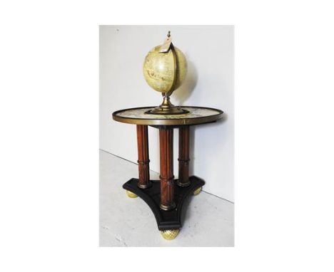 An antique design globe centre table, the globe top over brass bound top with map insert over triform base, D.76cm x H.126cm