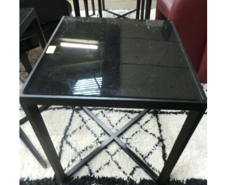 A set of three black lacquered lamp tables with glass inserts (3)