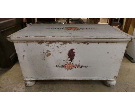 A Continental painted trunk with handpainted floral decoration