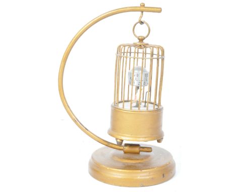A vintage retro mid 20th century circa. 1930's German Kaiser bird automaton clock being in the form of a bird within gilt met