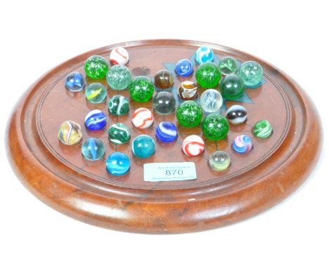 A collection of retro vintage toy glass marbles, to include 2 Victorian cat's eye, galaxy, with helix twist patterns and more