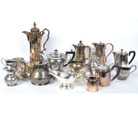 A collection of vintage 20th Century silver plate and copper. Comprising of teapots, water jugs, kettles, gravy boats, milk j