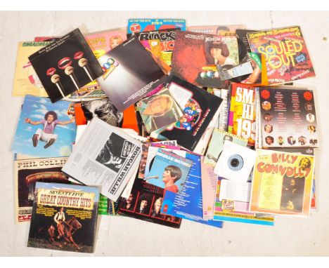 A large collection of vintage 20th century LP vinyl records comprising of Rolling Stones, U2, Chas &amp; Dave, Tom Jones, The