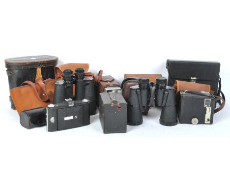 A collection of vintage 20th century cameras, video cameras and binoculars comprising of a Regent 10 x 50, Kodak Brownie, Ult