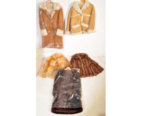 A collection of vintage 20th century coats to include ladies’ furs being lined and with labels and some paperwork together wi